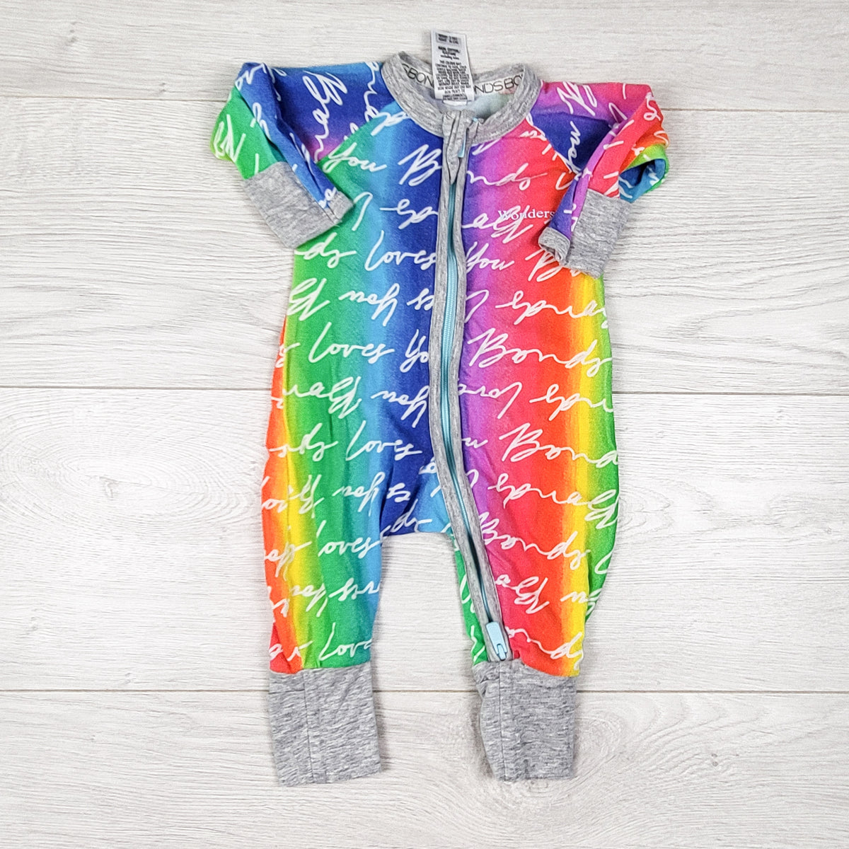 Bonds rainbow coloured zippered wondersuit sleeper. Newborn size