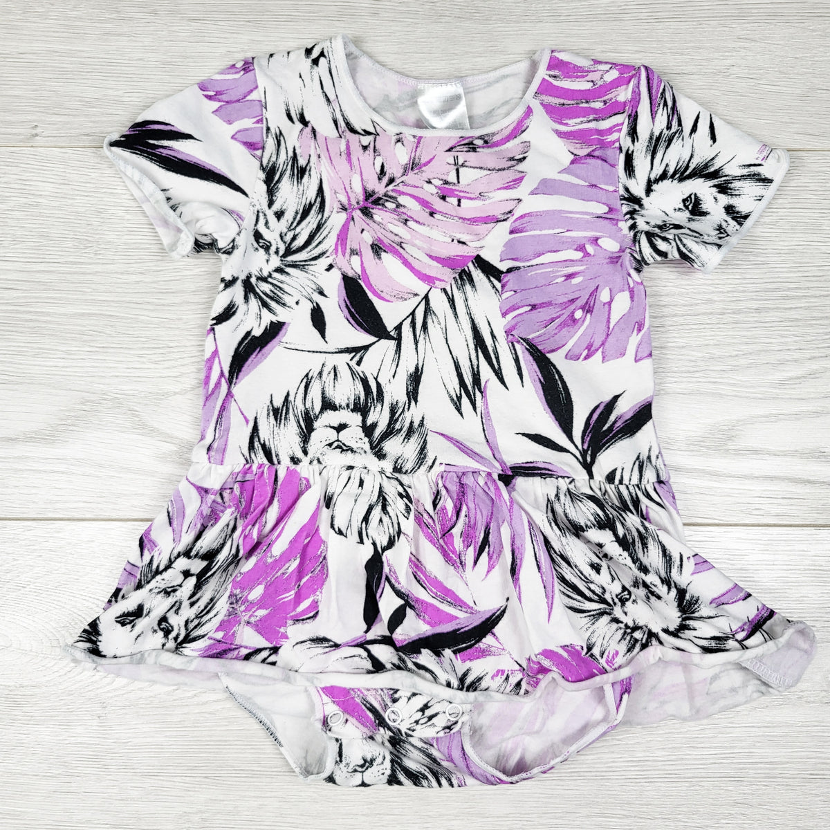 Bonds white and purple frond print skirted bodysuit. Size 6-12 months