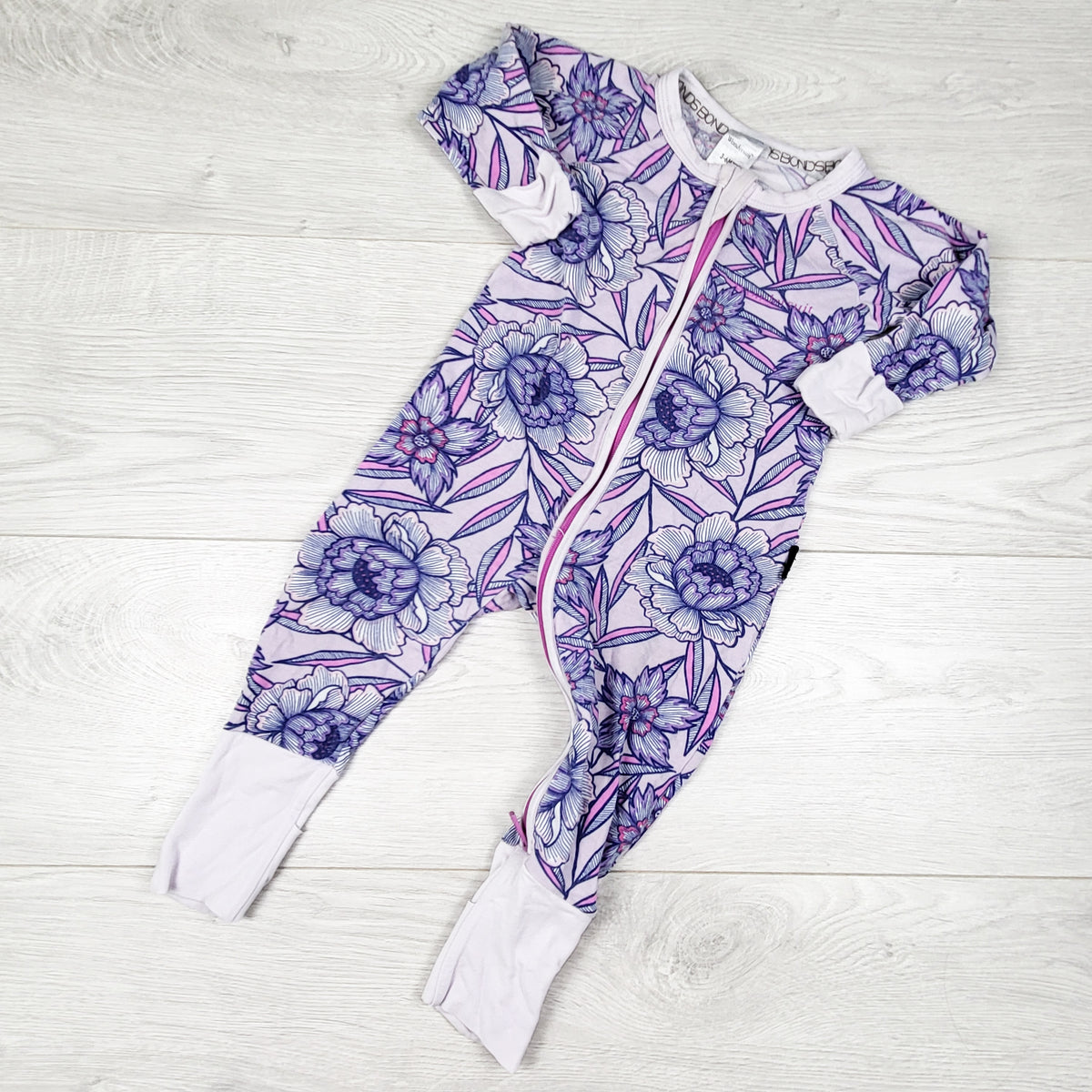 Bonds purple floral print zippered wondersuit sleeper. Size 3-6 months