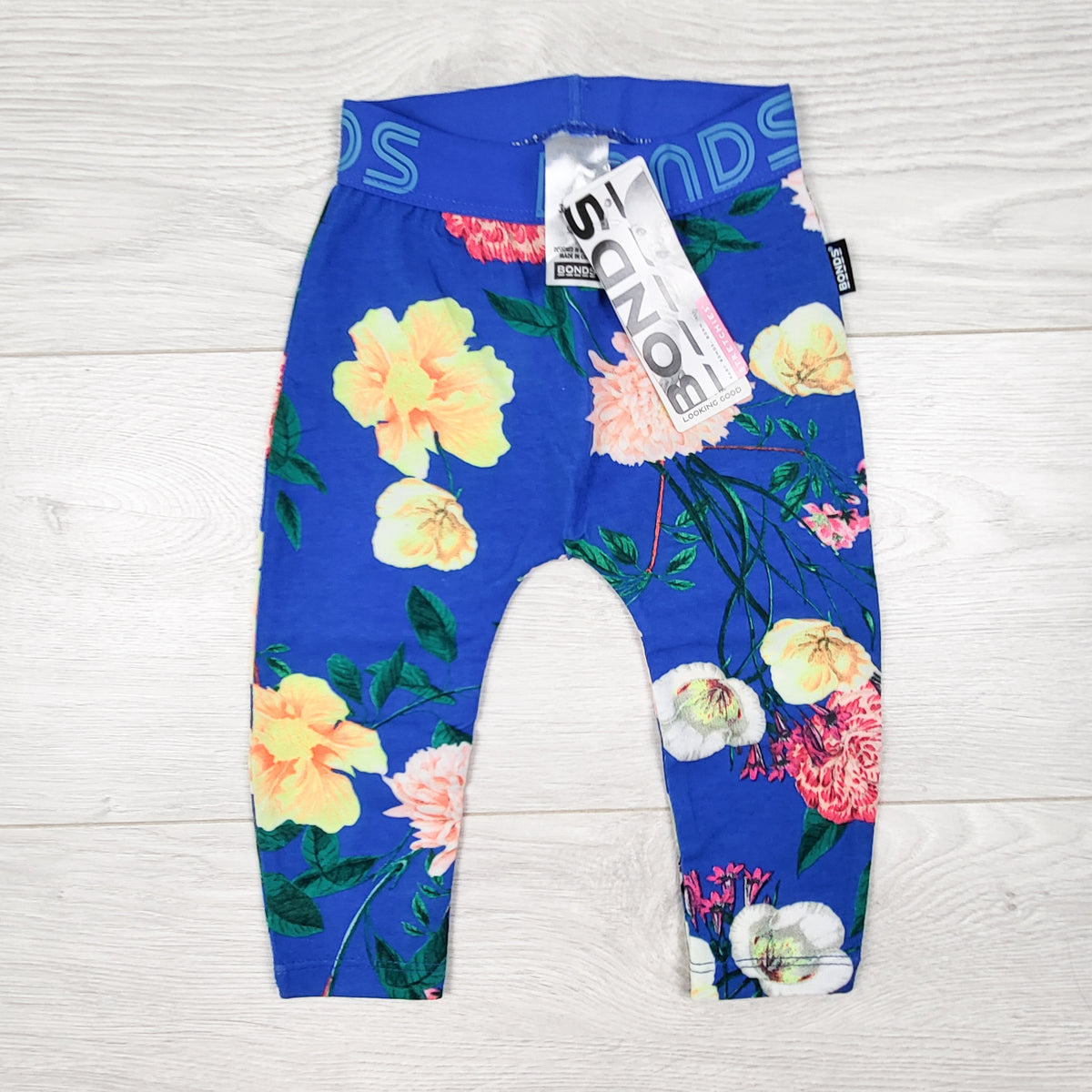 NEW - Bonds blue floral print leggings. Size 3-6 months