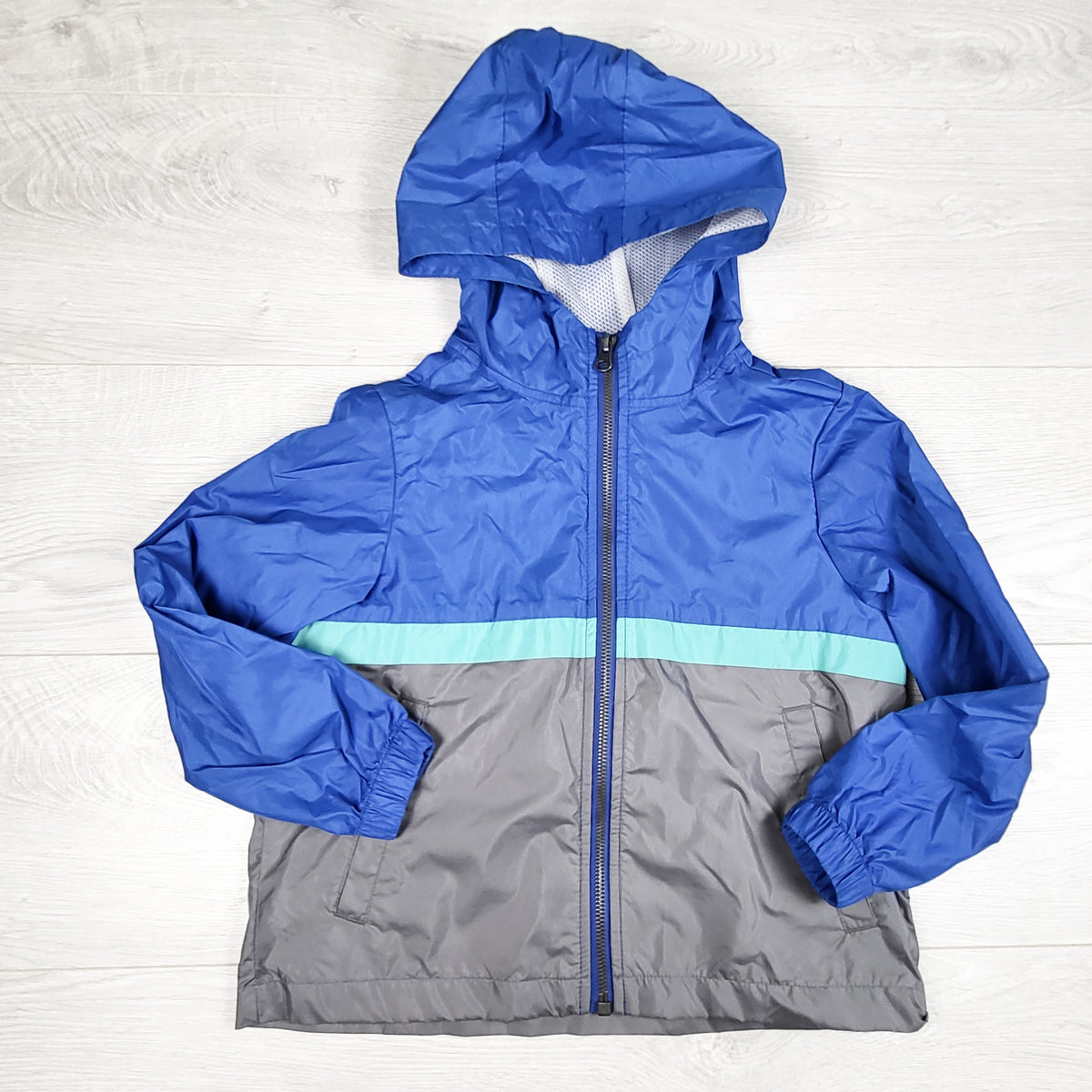 Old Navy blue and grey colour block windbreaker jacket. Size 5T