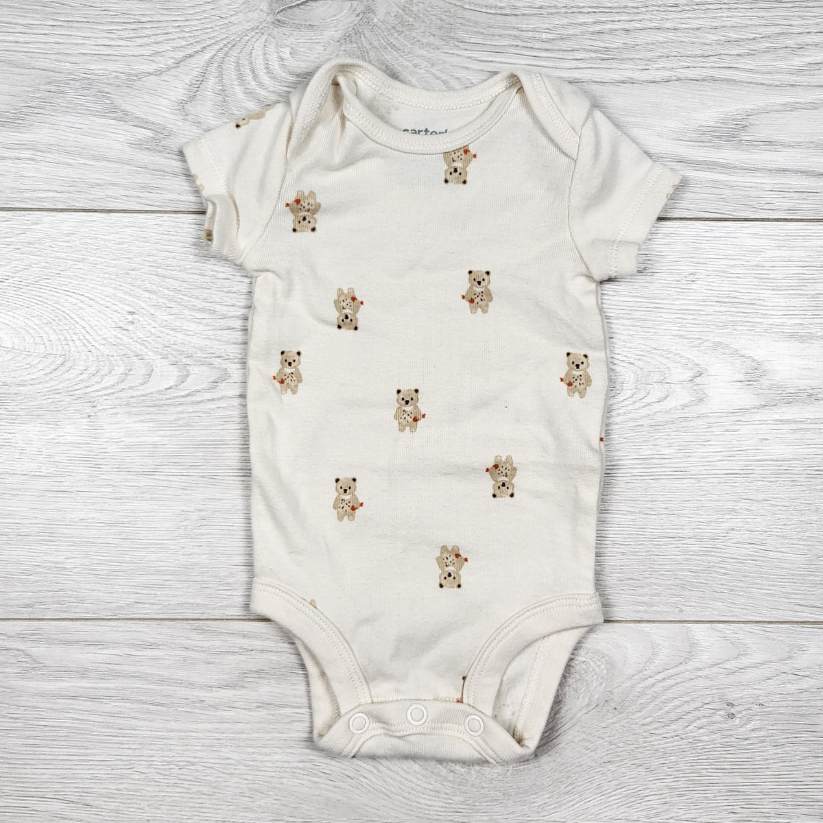Carters cream coloured teddy bear print bodysuit. Newborn size