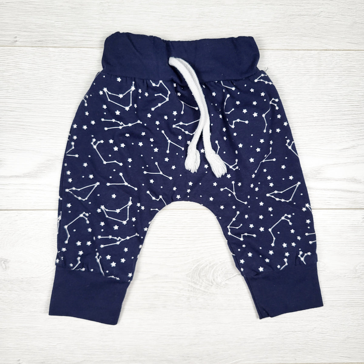 Navy jogger style pants with star constellations. Size 0-3 months