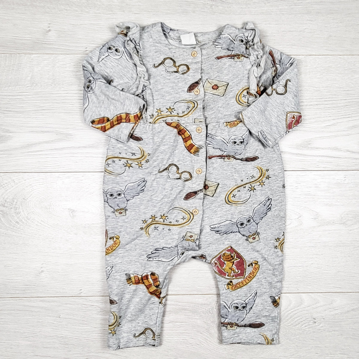 H and M grey Harry Potter ruffle romper. Size 4-6 months