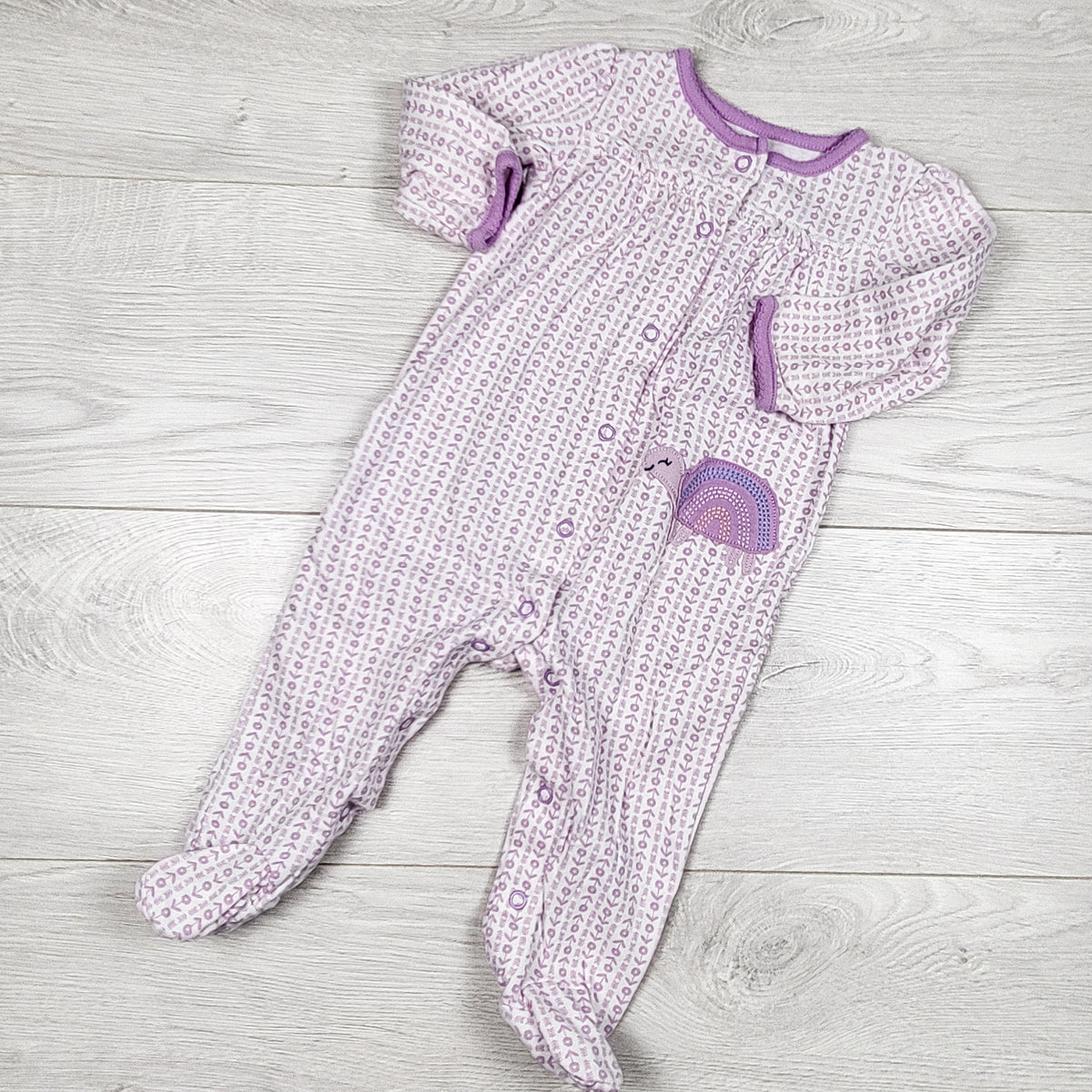 Child of Mine white and purple patterned sleeper with total. Size 6-9 months
