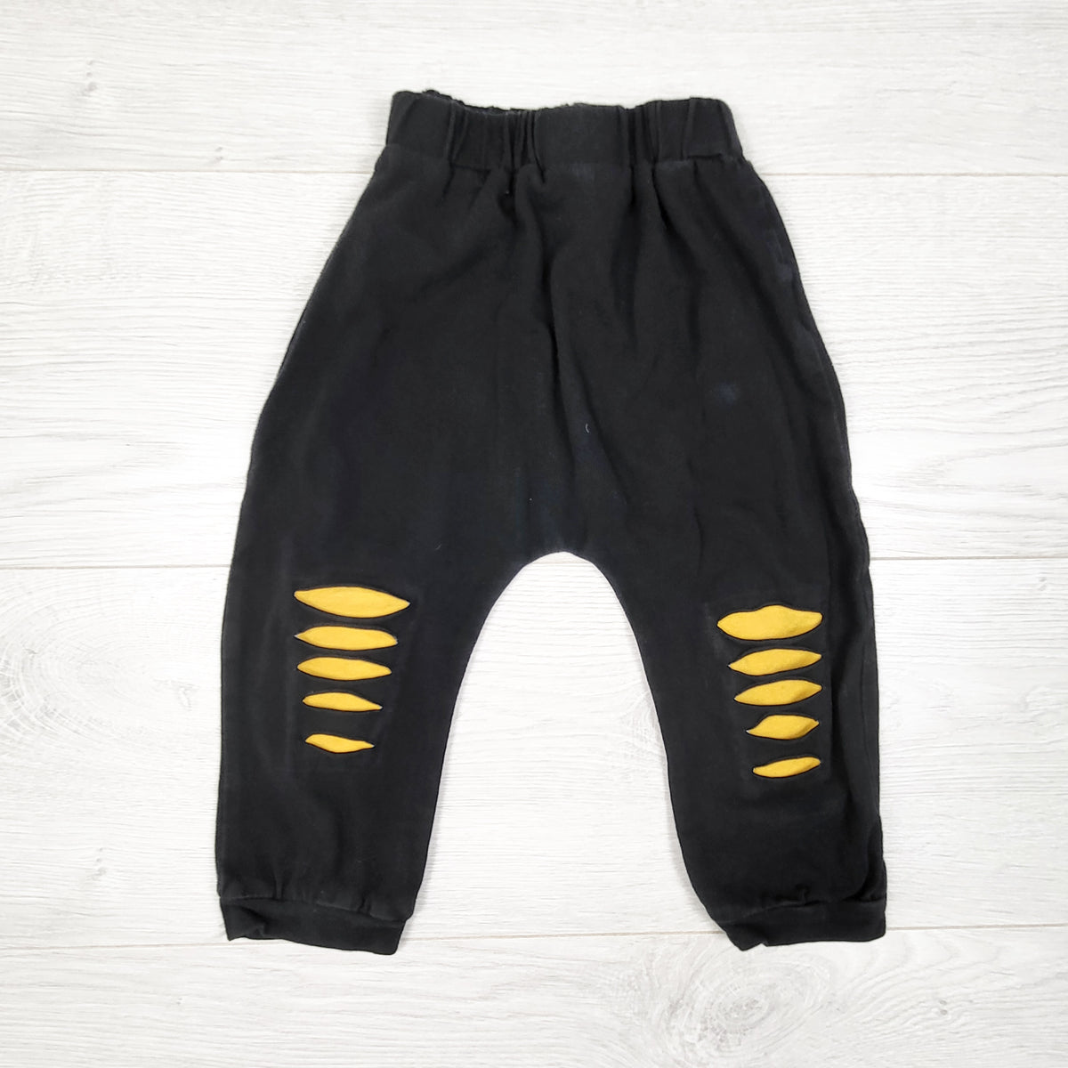 Pat Pat black and yellow distressed pants. Size 12-18 months