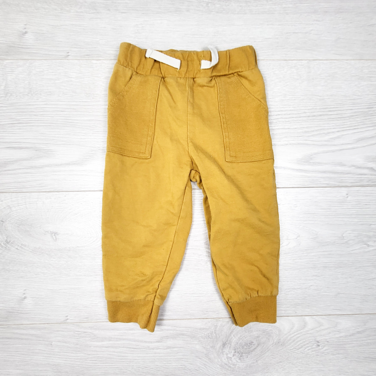 Carters mustard yellow cotton pants. Size 12 months