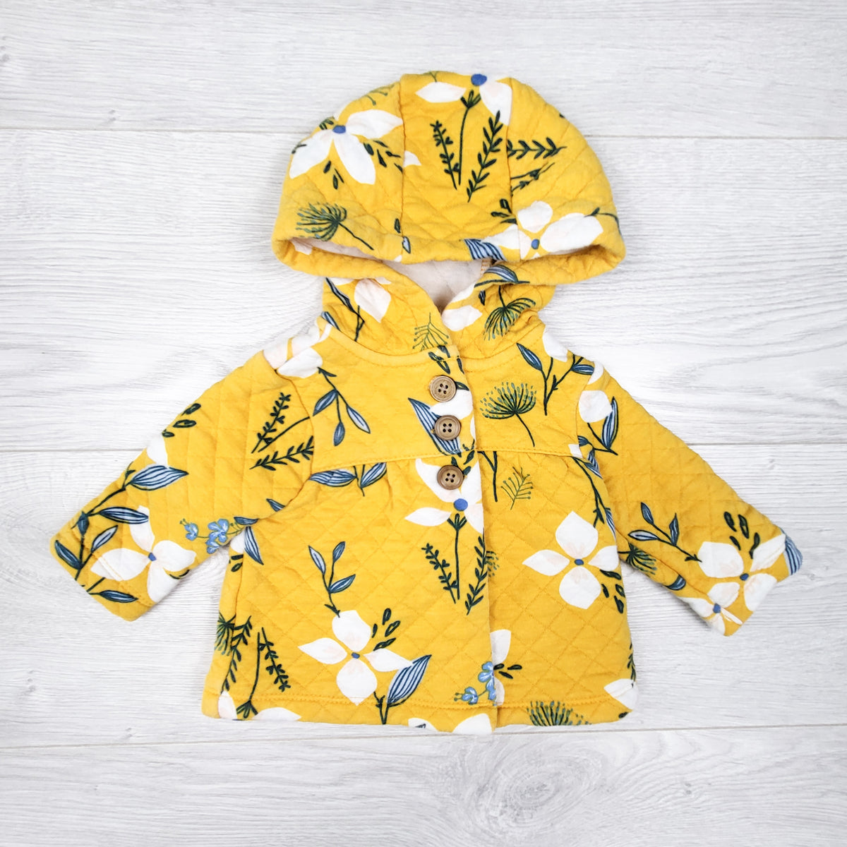 Carters yellow floral print quilted hoodie. Size 3 months