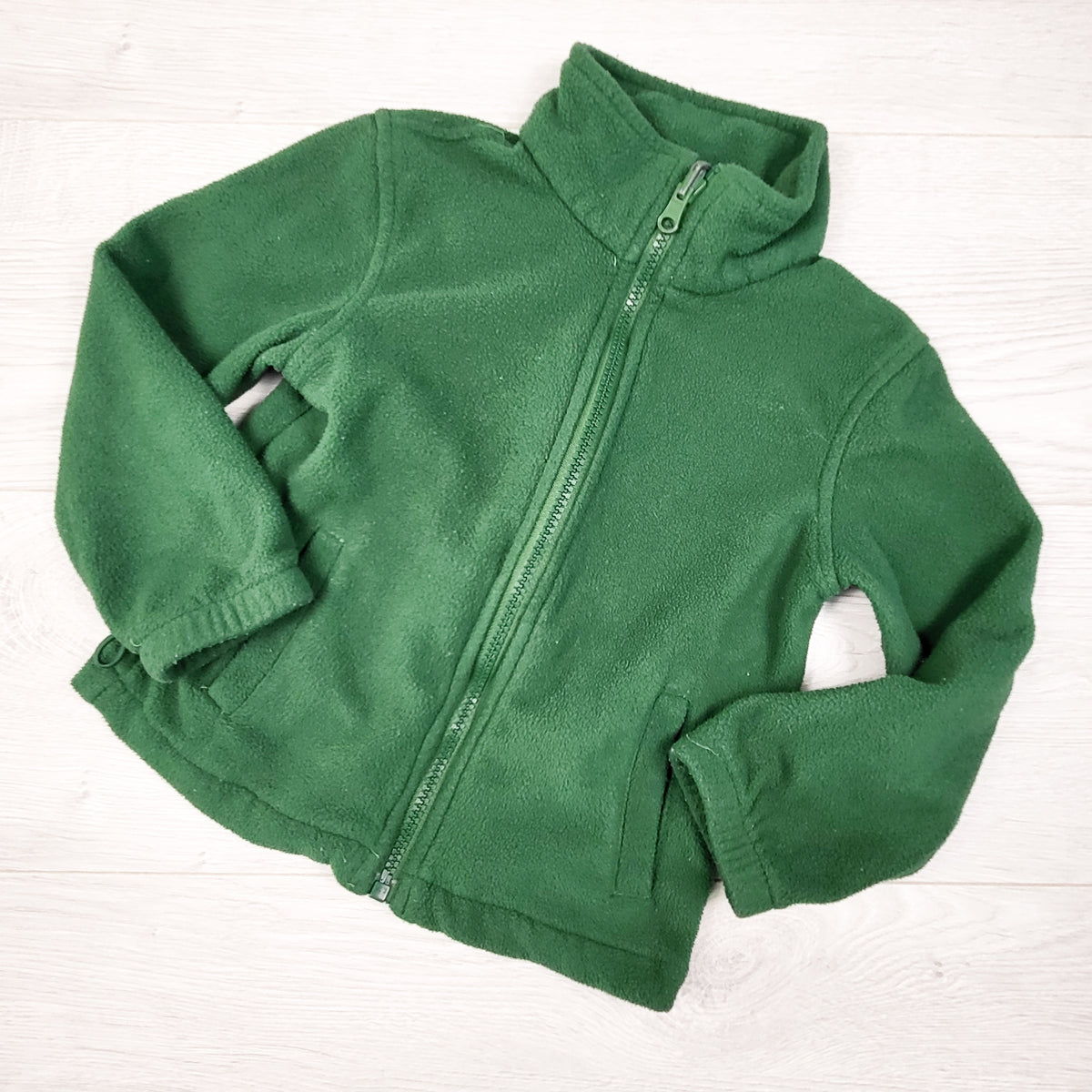 Mountain Warehouse green zip up fleece. Size 3/4T