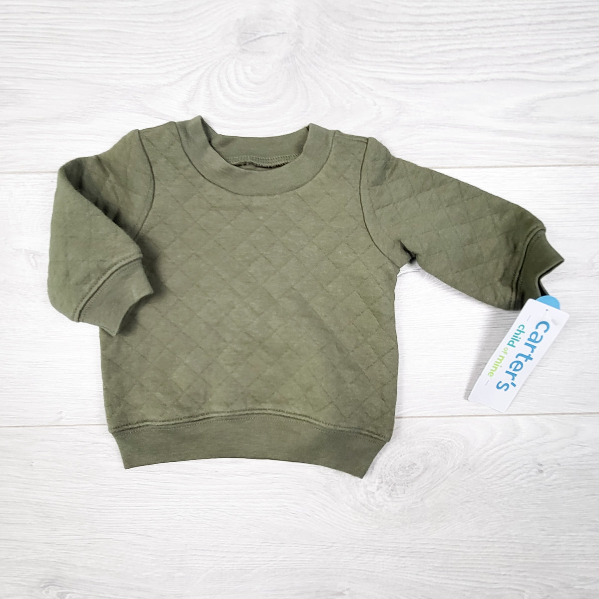 NEW - Child of Mine green quilted sweatshirt. Newborn size