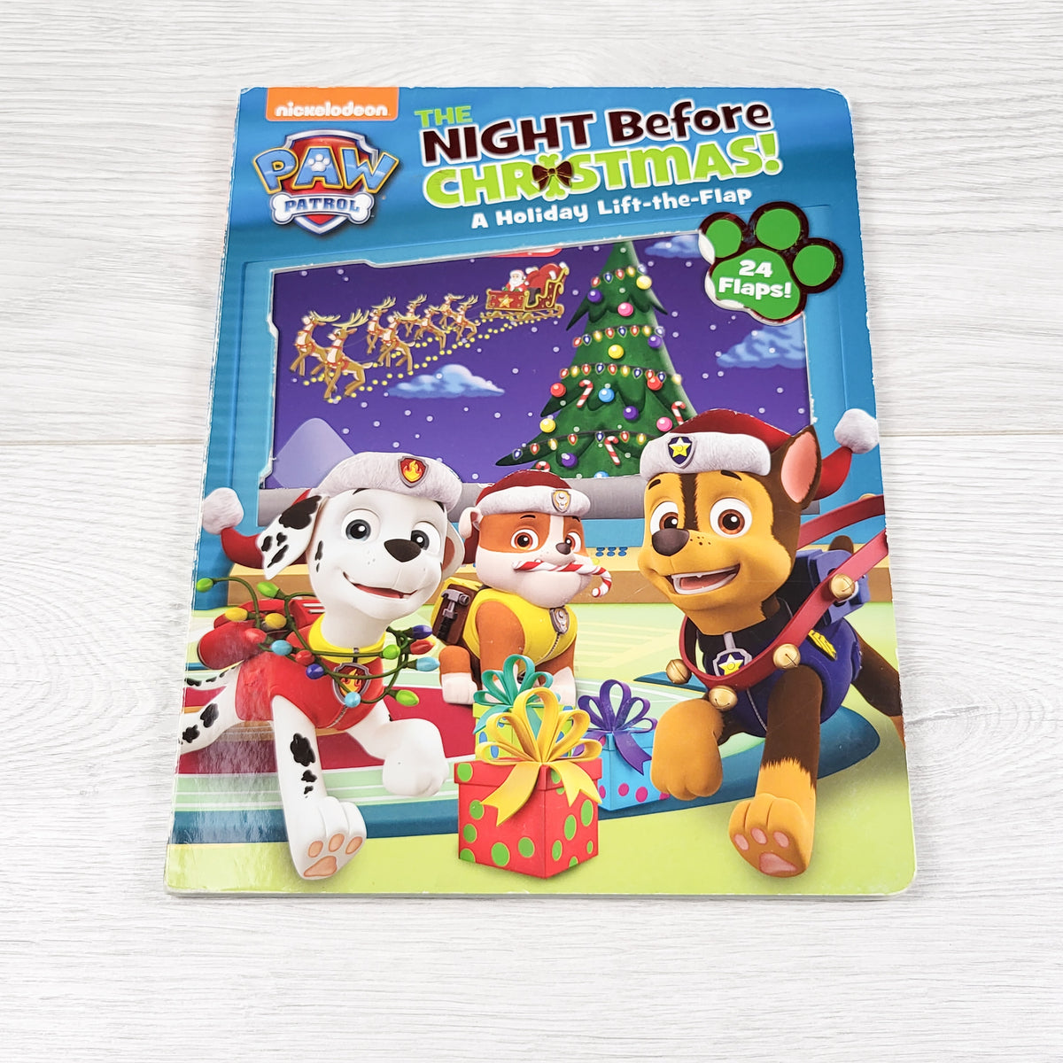 Paw Patrol: The Night Before Christmas. Lift the flap board book