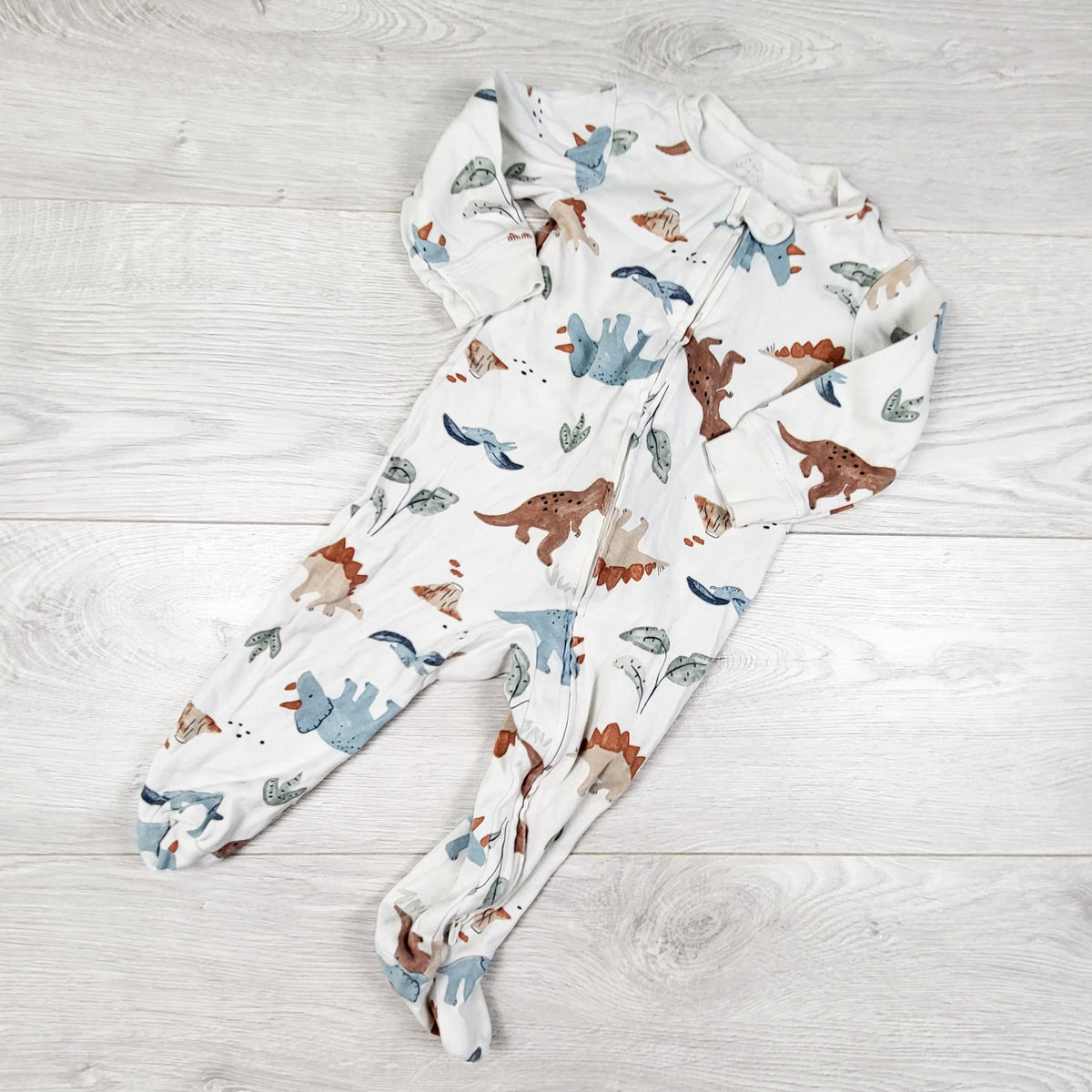 Carters white zippered cotton sleeper with dinosaurs. Size 9 months