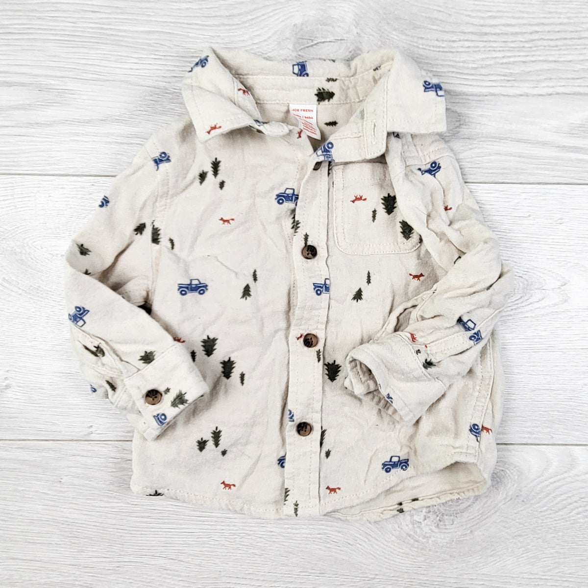 Joe oatmeal coloured button down flannel shirt with outdoor theme. Size 6-12 months