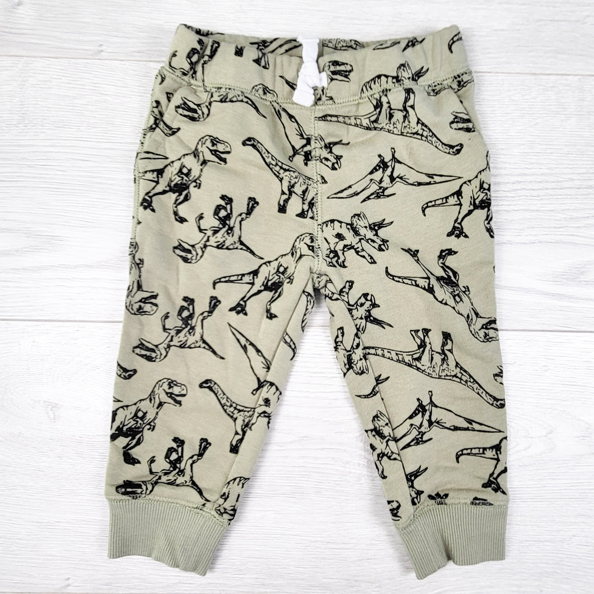 Joe green dinosaur print joggers. Size 6-12 months