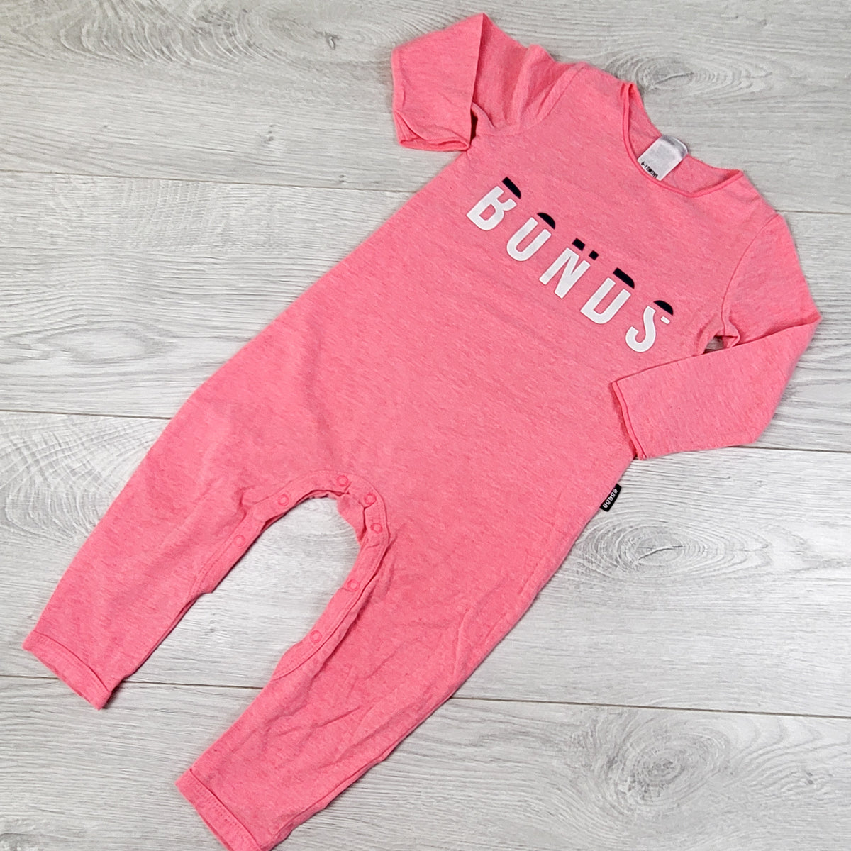 Bonds pink "Stretchies" romper. Size 6-12 months