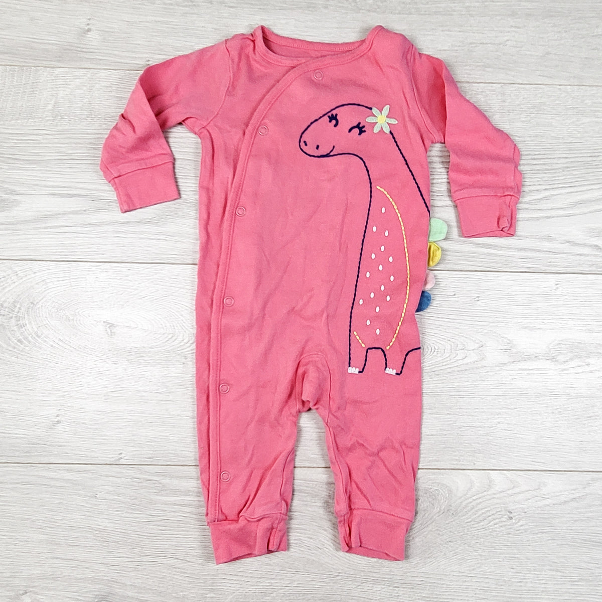 Carters pink sleeper with dinosaur. Size 6 months