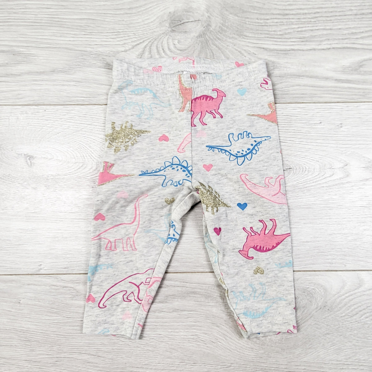 Carters grey dinosaur print leggings. Size 6 months
