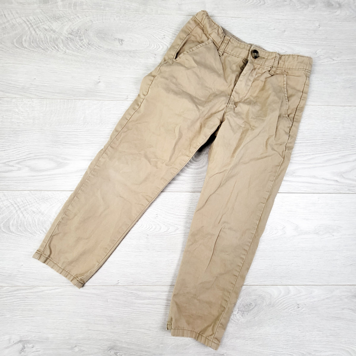 H and M beige relaxed fit pants. Size 4/5T