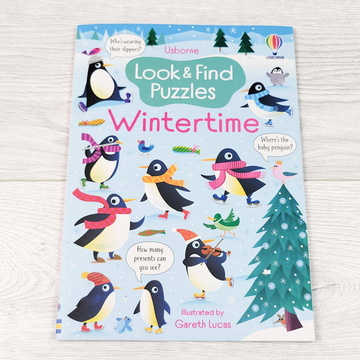 Usborne Look and Find Puzzles: Wintertime. Soft cover book