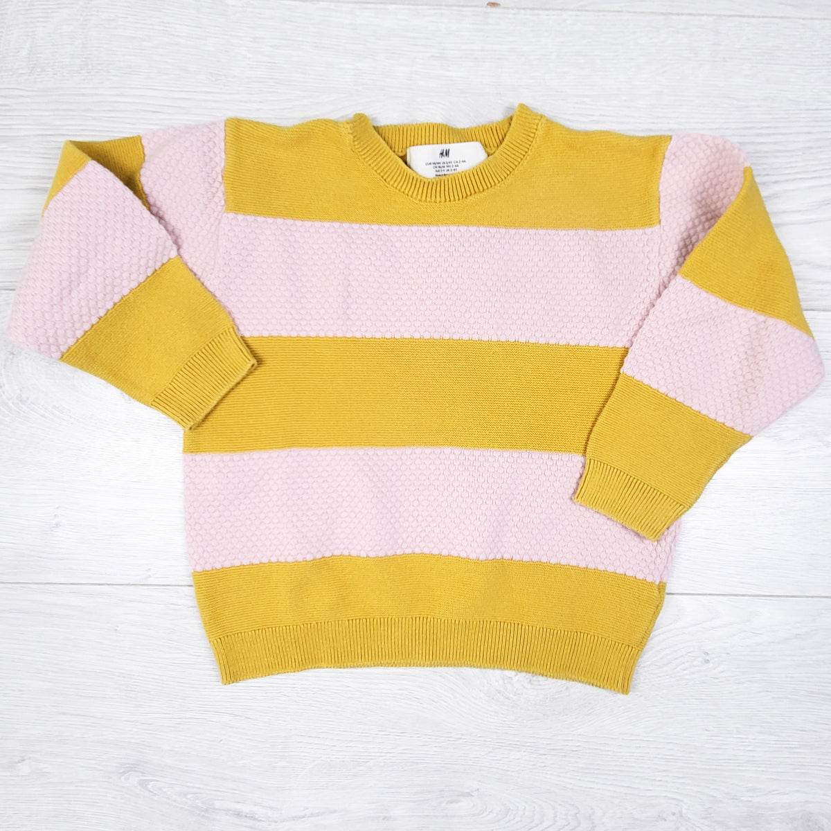 H and M yellow and pink textured sweater. Size 2-4T