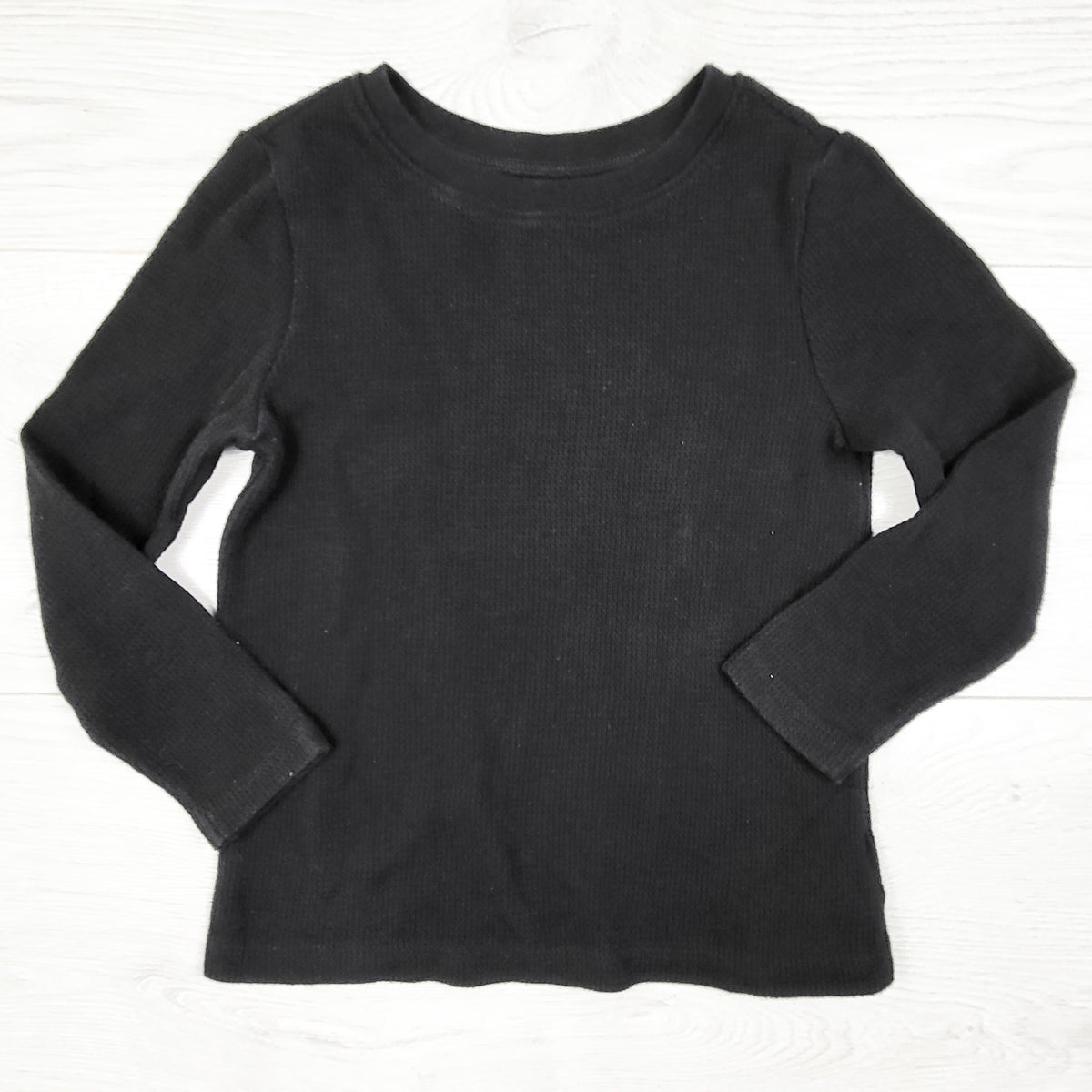 Old Navy black waffle knit long sleeve top. Size 4T