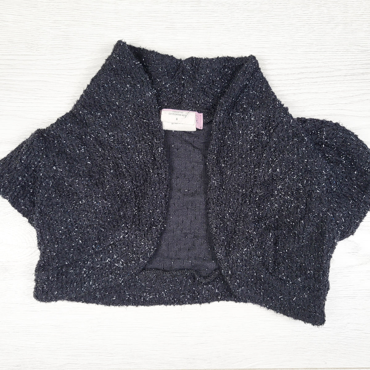 Sweet Charm black knit shrug style sweater with sparkles. Size 6