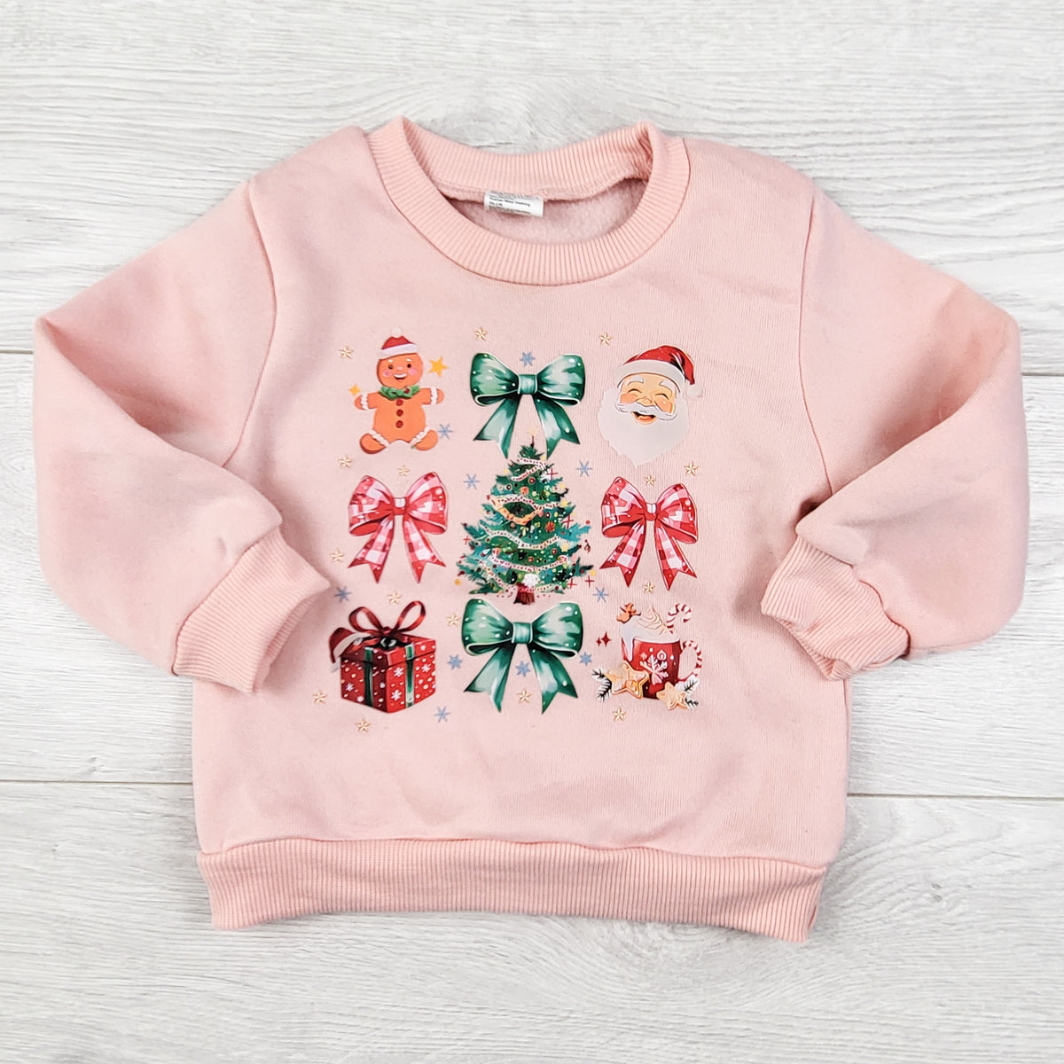 Pink fleecy lined Christmas themed sweatshirt. Size 12-18 months