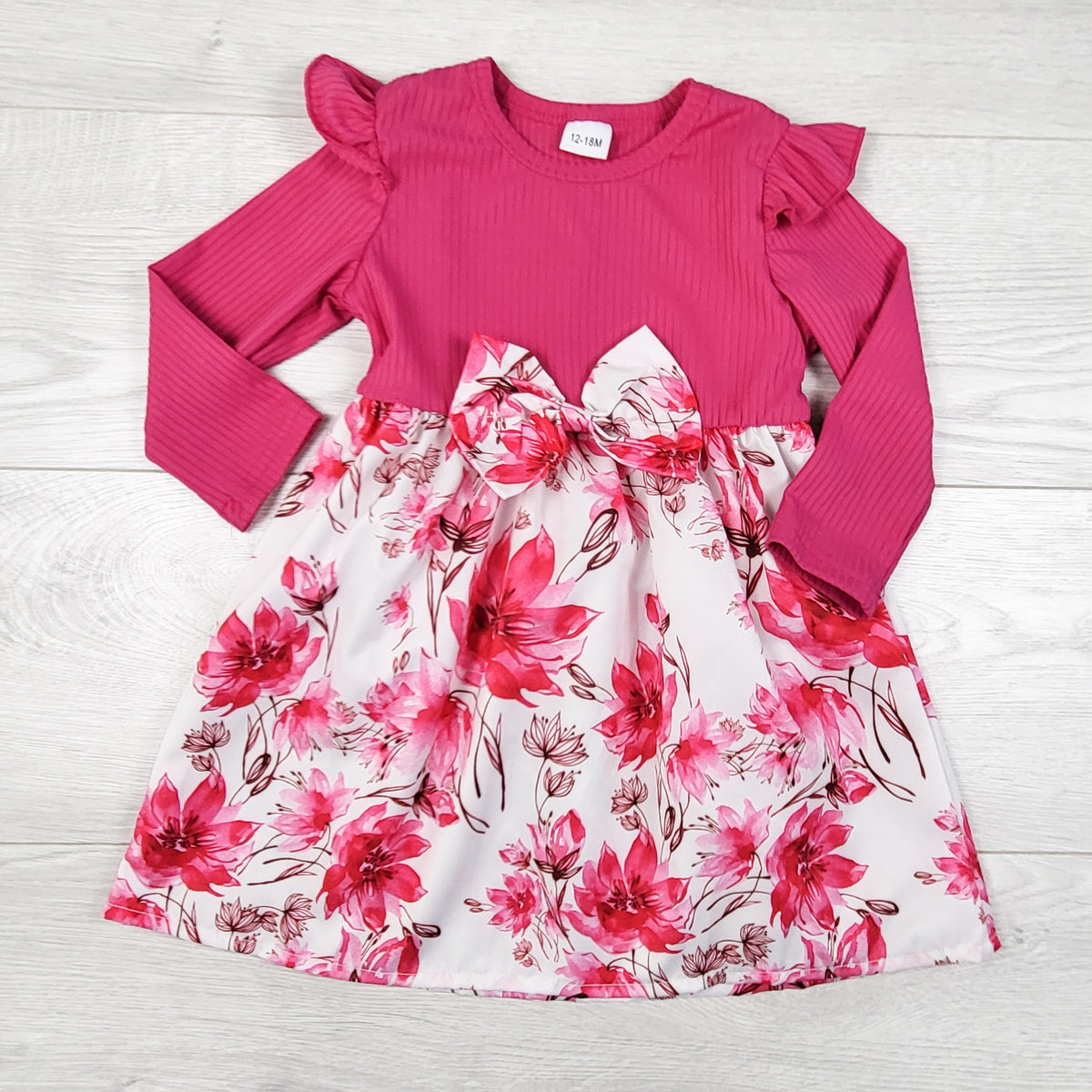 Pink ribbed floral print dress. Size 12-18 months