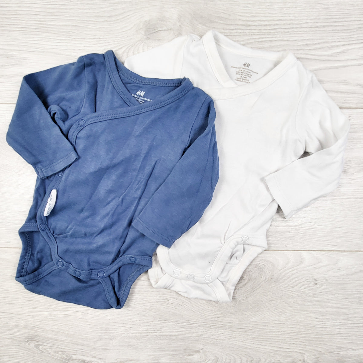 H and M 2-pack wrap style bodysuits. Size 2-4 months