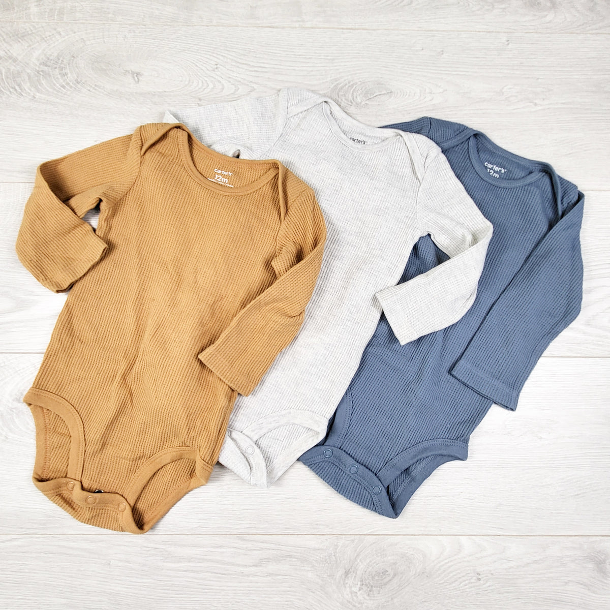 Carters 3-pack waffle knit bodysuits. Size 12 months