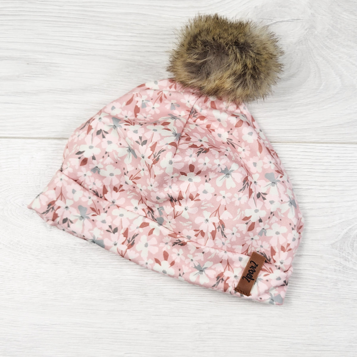 Deux Par Deux pink floral print pom pom hat. Size 3-6 months
