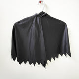 Spirit Halloween black hooded cape. Size medium