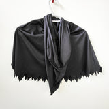 Spirit Halloween black hooded cape. Size medium