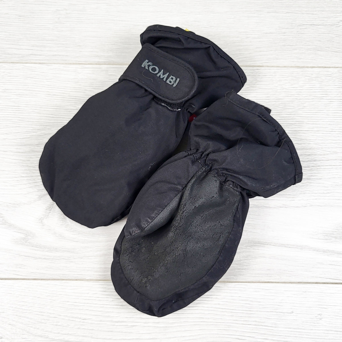 Kombi black mittens.  Size large (size 5/6 Years)