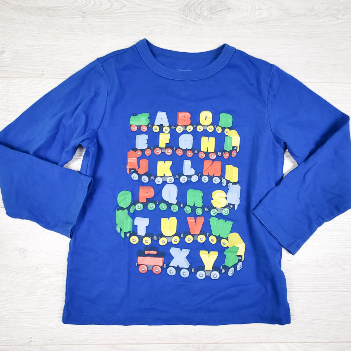 Children's Place blue alphabet train long sleeve top. Size 4T
