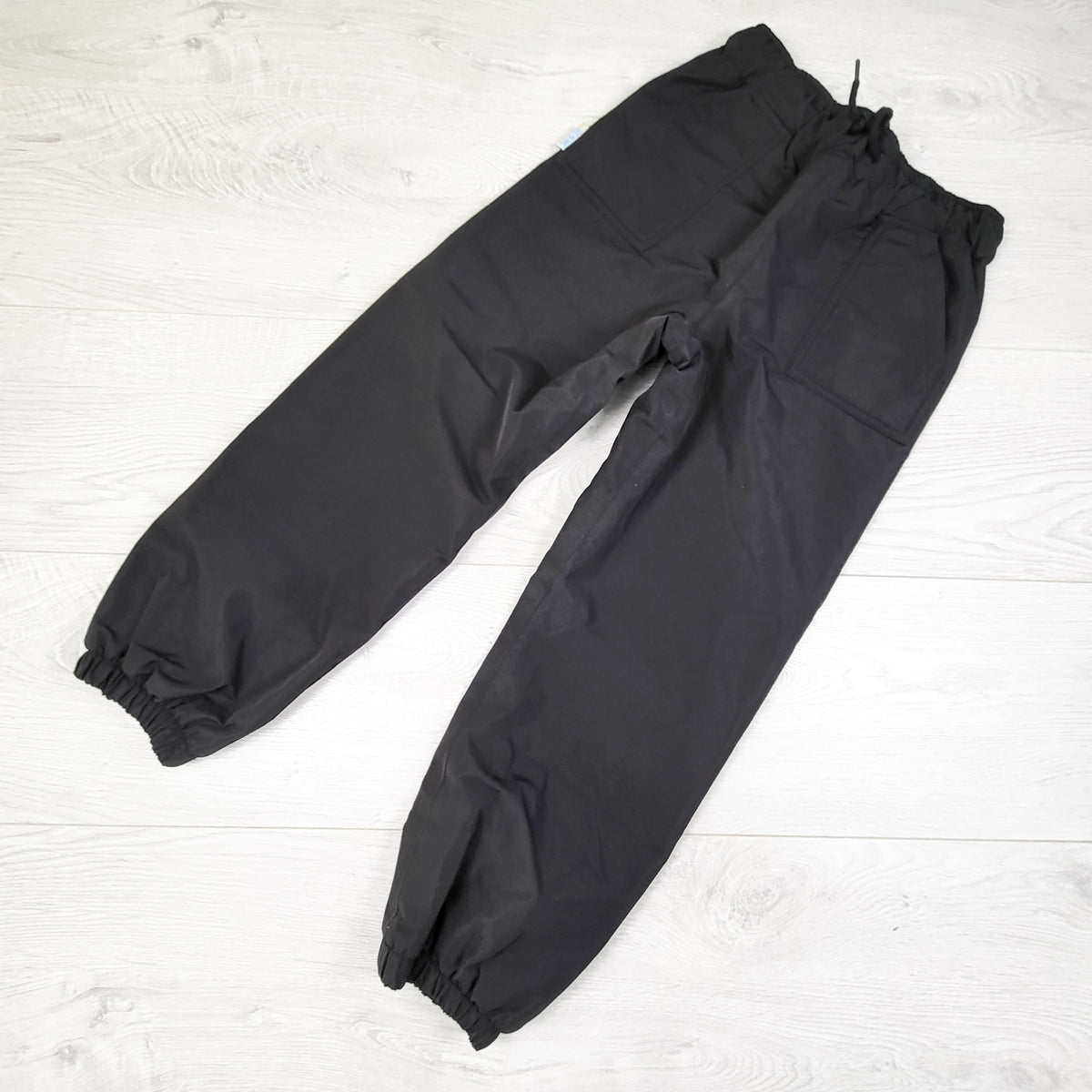 Jan and Jul Black Fleece Lined Rain Pants. Size 6 Years