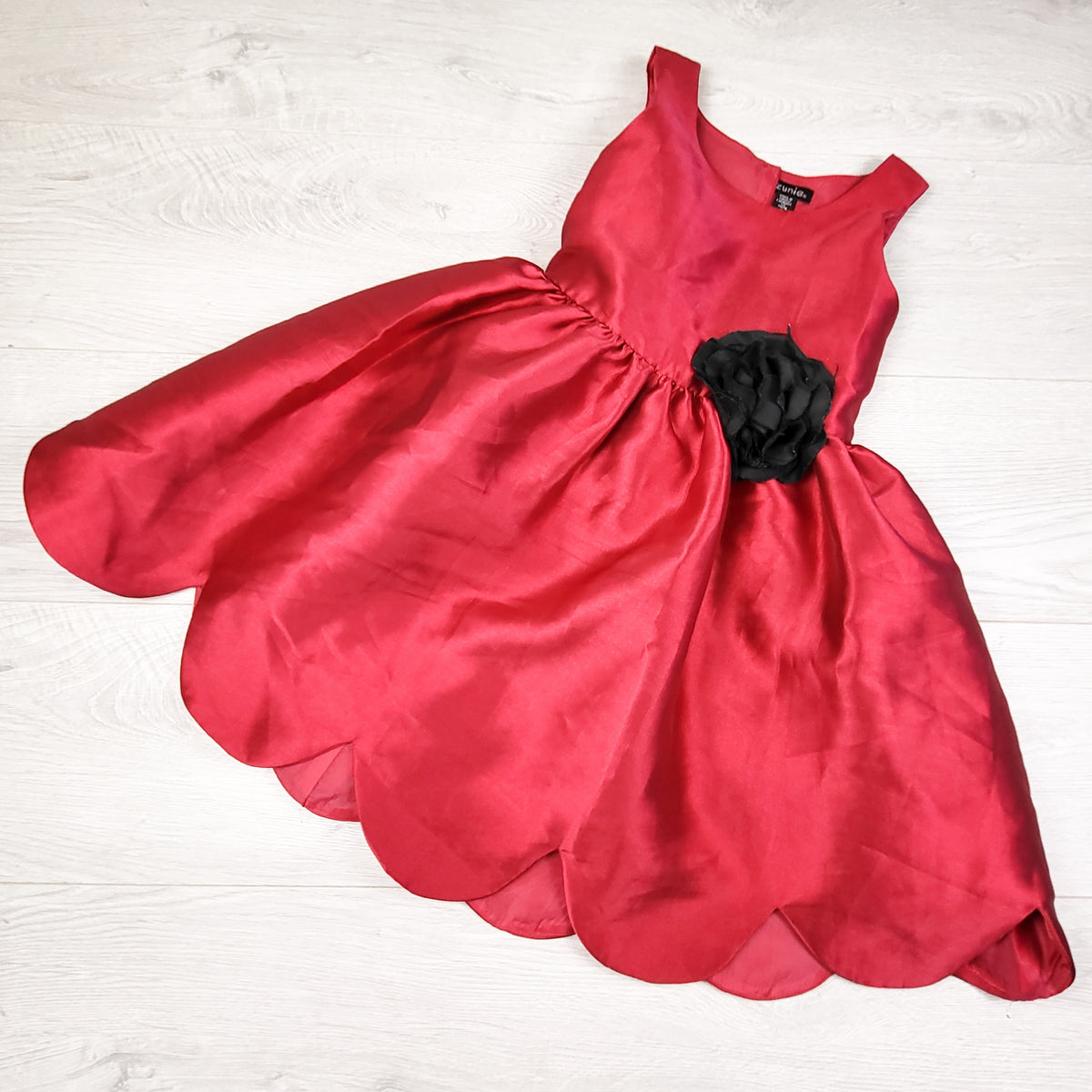 Zunie red special occasion dress with flower. Size 6