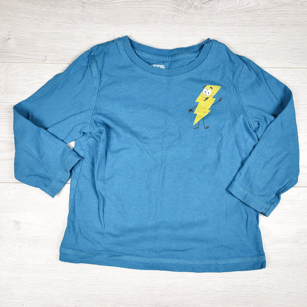 George blue long sleeve top with lightening bolt. Size 3T