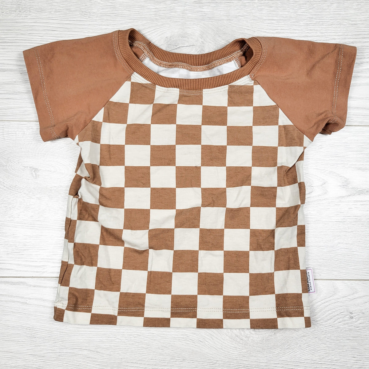 Tan checkerboard print t-shirt. Size 1T