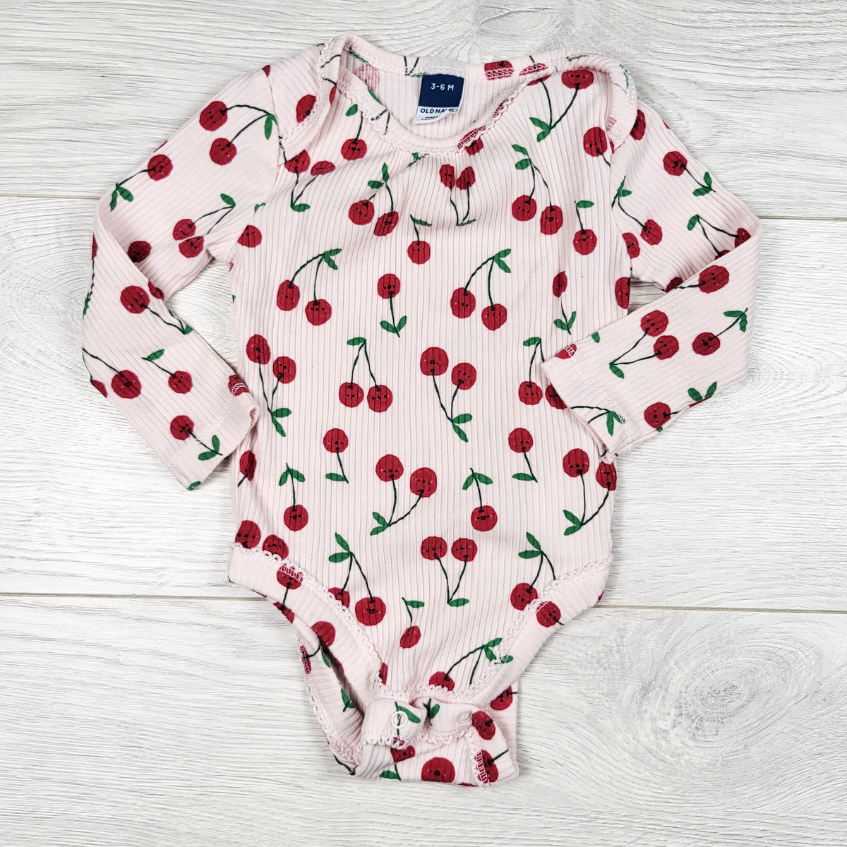 Old Navy pink ribbed cherry print bodysuit. Size 3-6 months