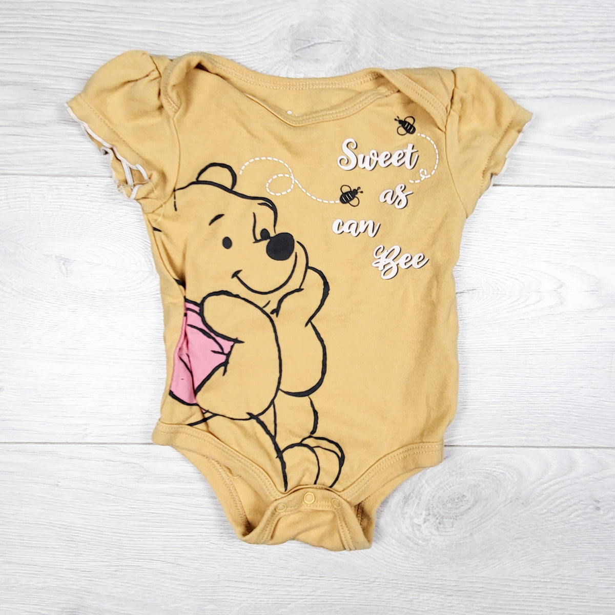 Disney Baby golden yellow Winnie the Pooh bodysuit. Size 6-9 months