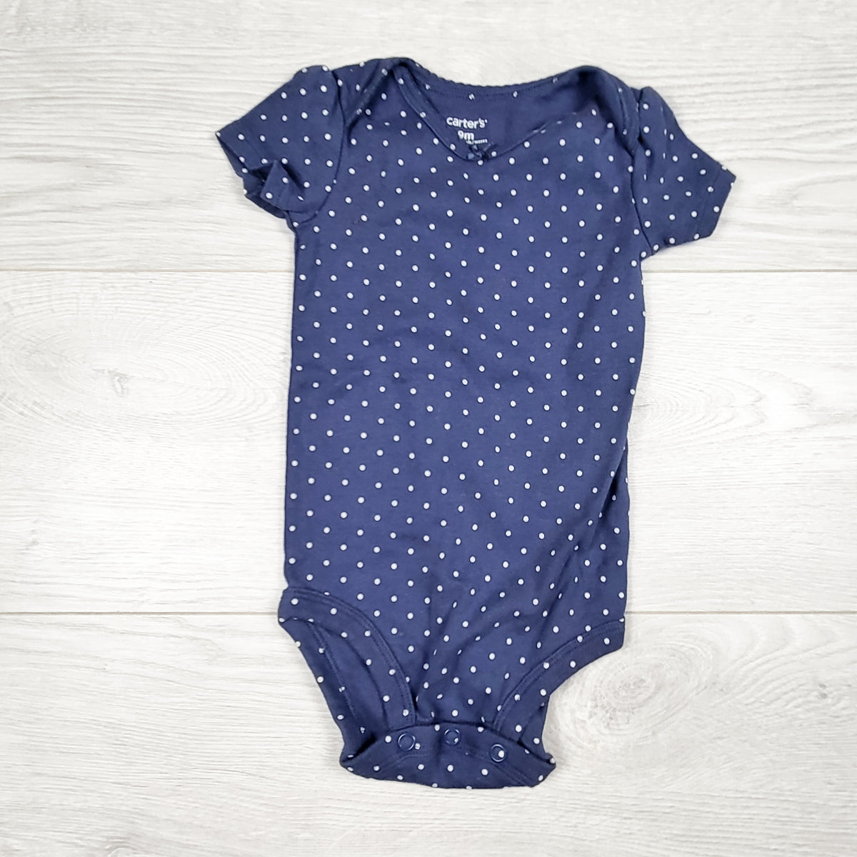 Carters blue polka dot bodysuit. Size 9 months