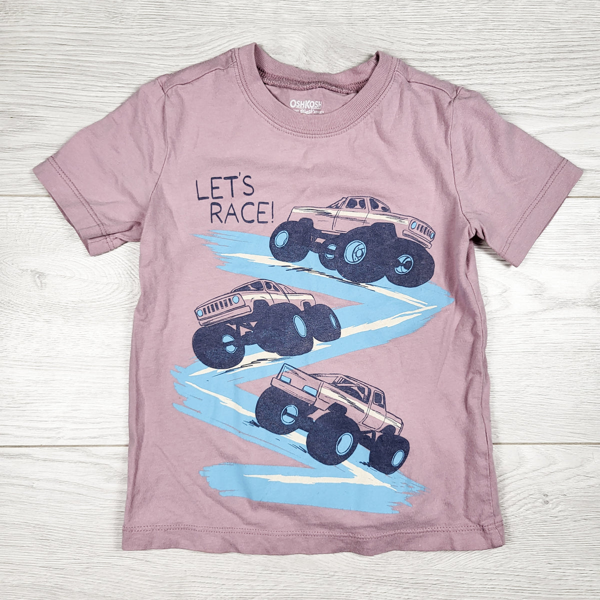 Oshkosh lavendar t-shirt with monster trucks. Size 2T