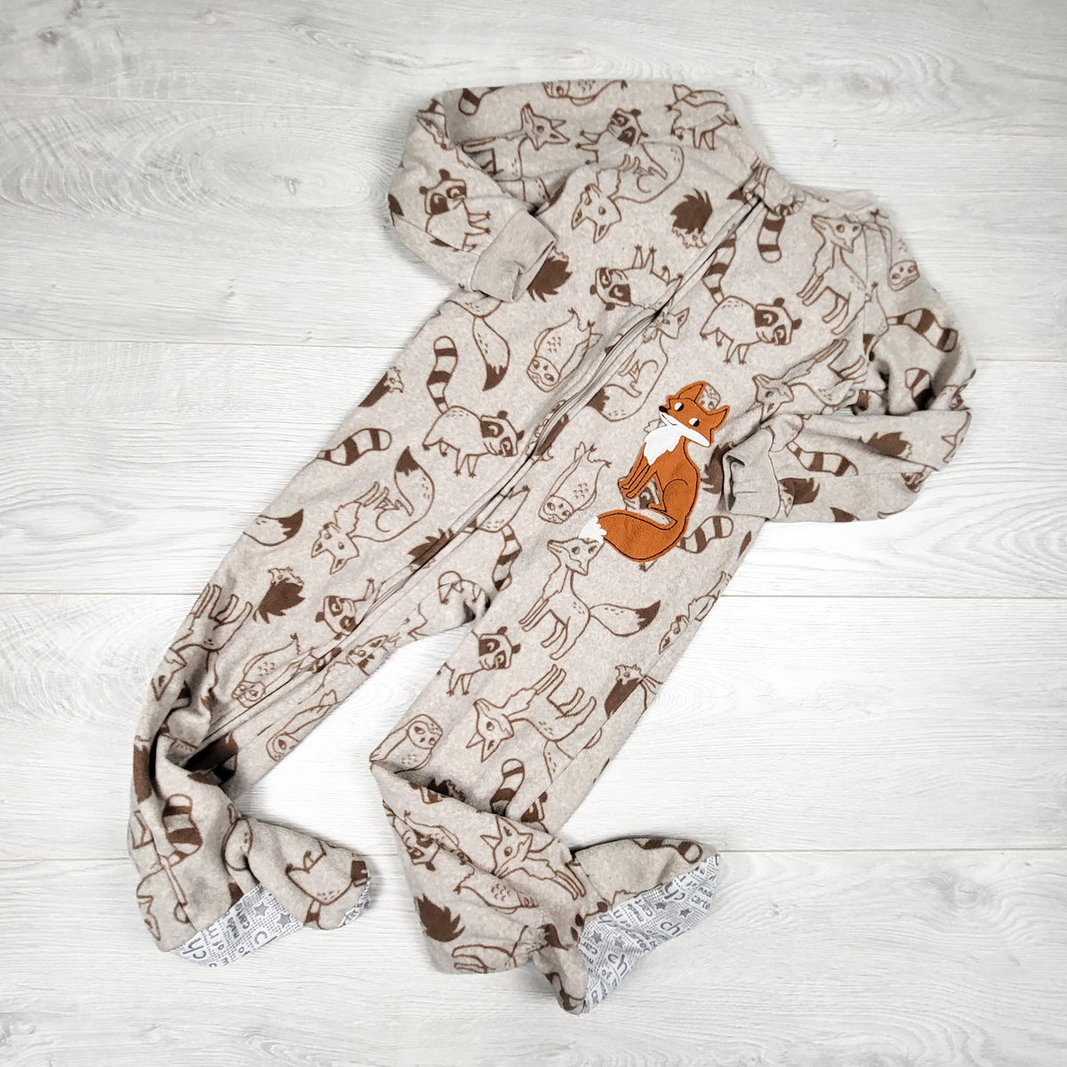 Child of Mine beige zippered fleece sleeper with woodland animals. Size 3T