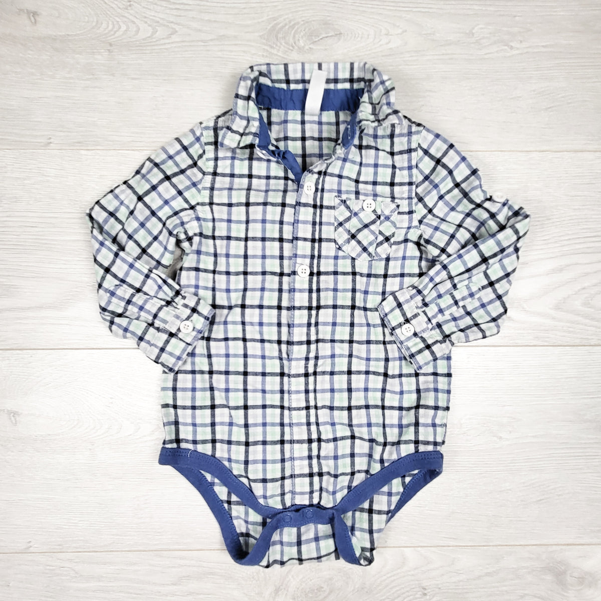 Cherokee plaid button down bodysuit. Size 18 months