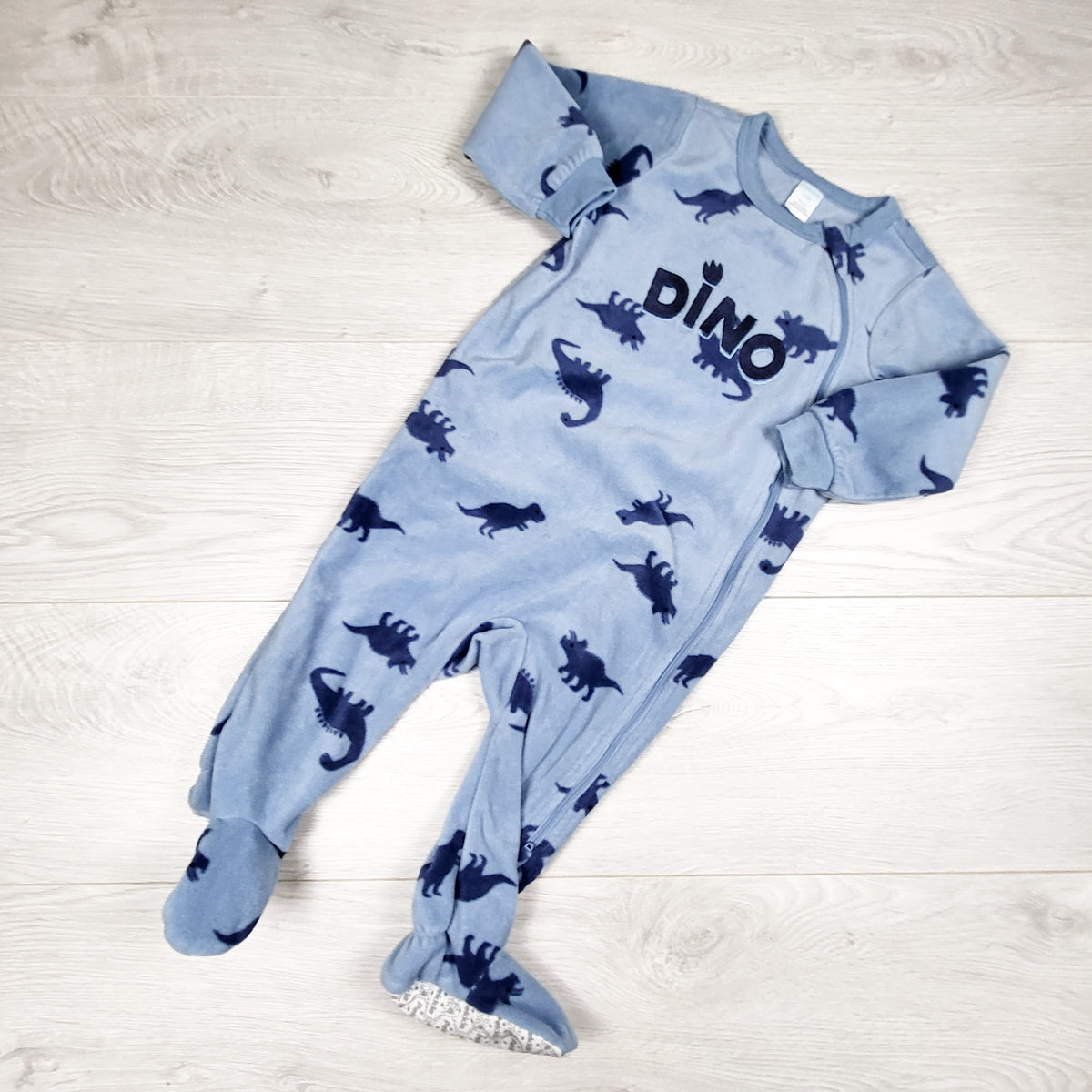 Pekkle blue zippered fleece sleeper with dinosaurs. Size 12 months