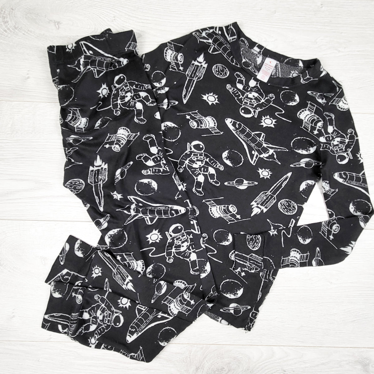 Joe Fresh black 2pc knit PJs with space theme. Size 7/8