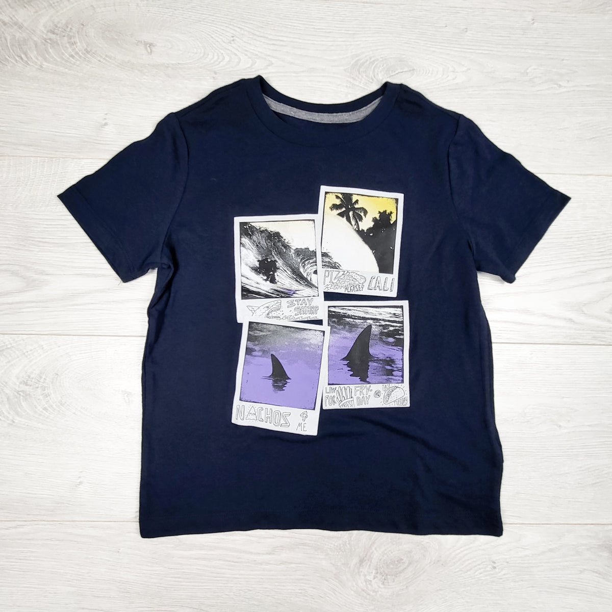 Old Navy navy t-shirt with polaroids. Size 6/7
