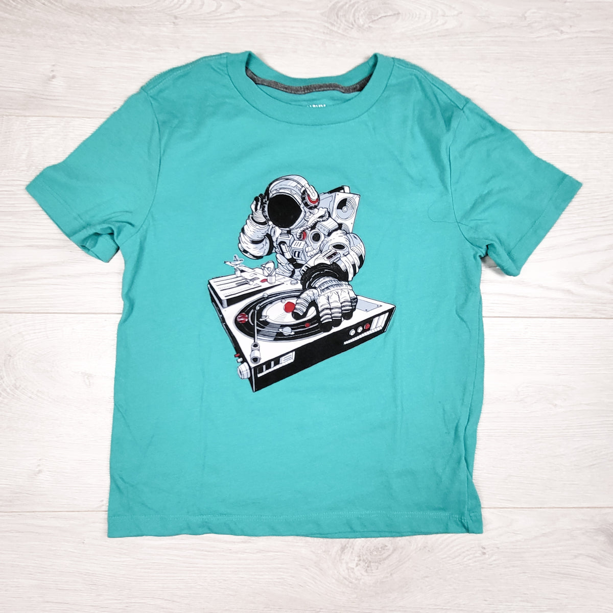 Old Navy turquoise t-shirt with astronaut DJ. Size 6/7