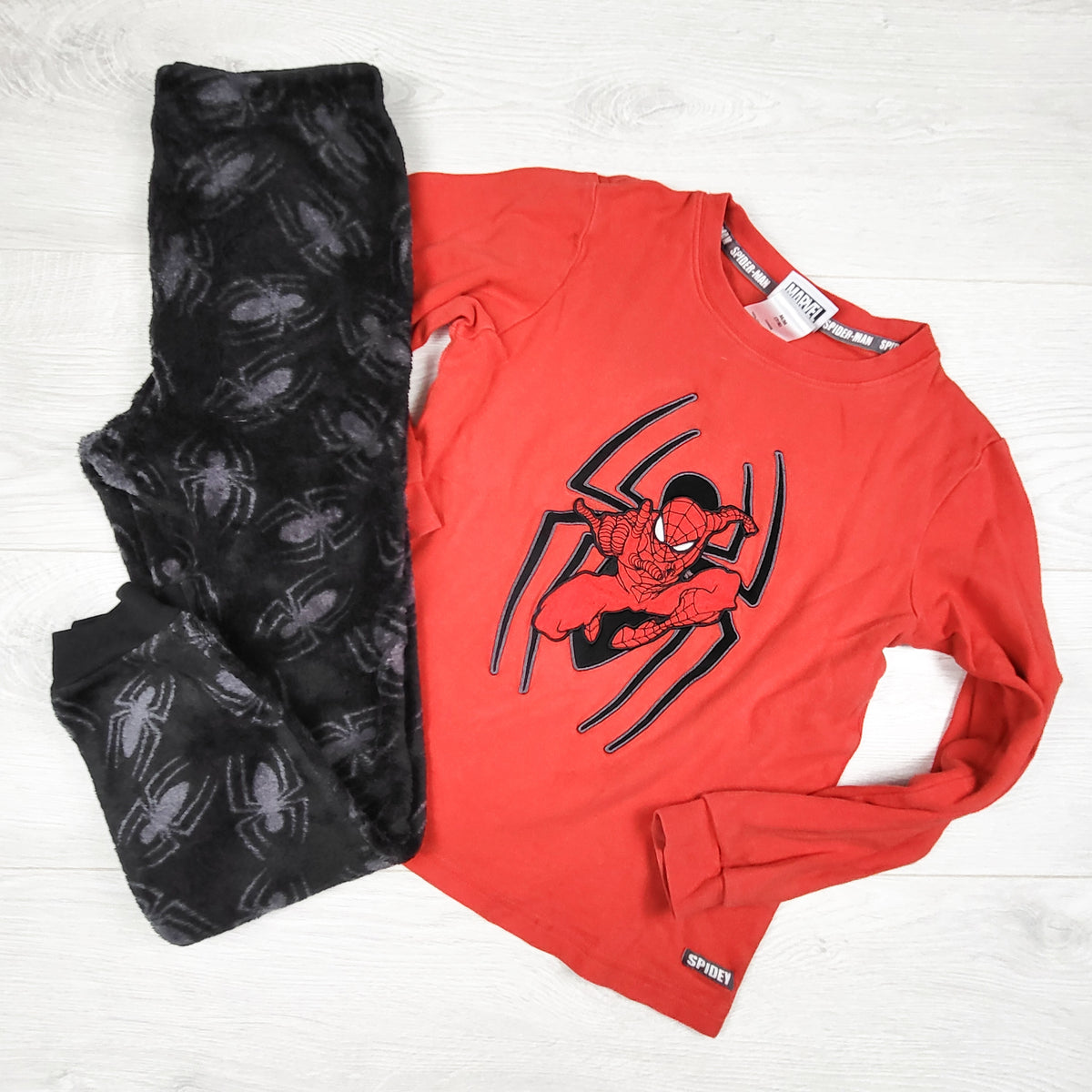 Red and black 2pc Spider-man PJs (pants are plush.) Size 7/8